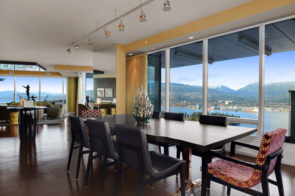 Dining space inlet views apartment in vancouver