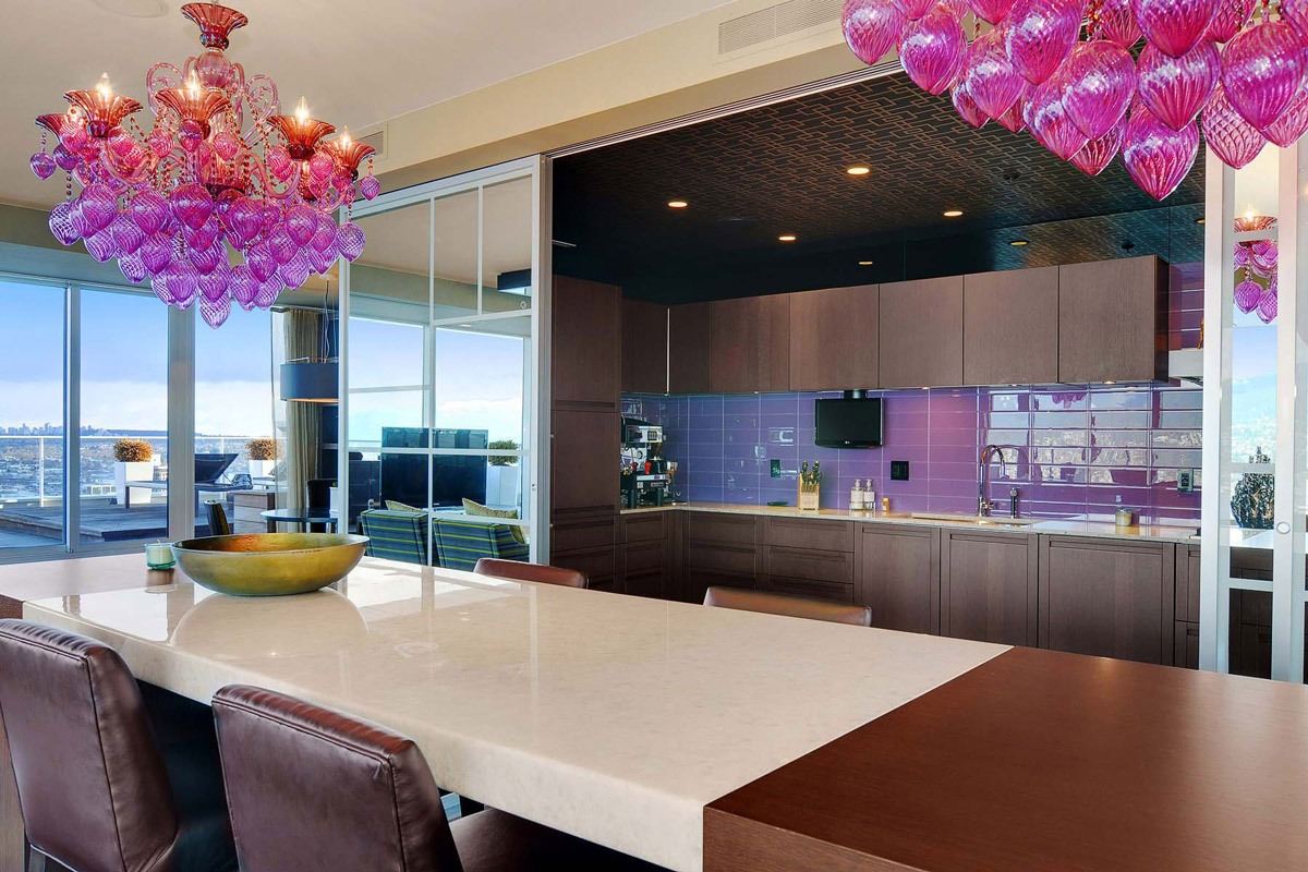 Purple pink chandelier dining table kitchen apartment in vancouver
