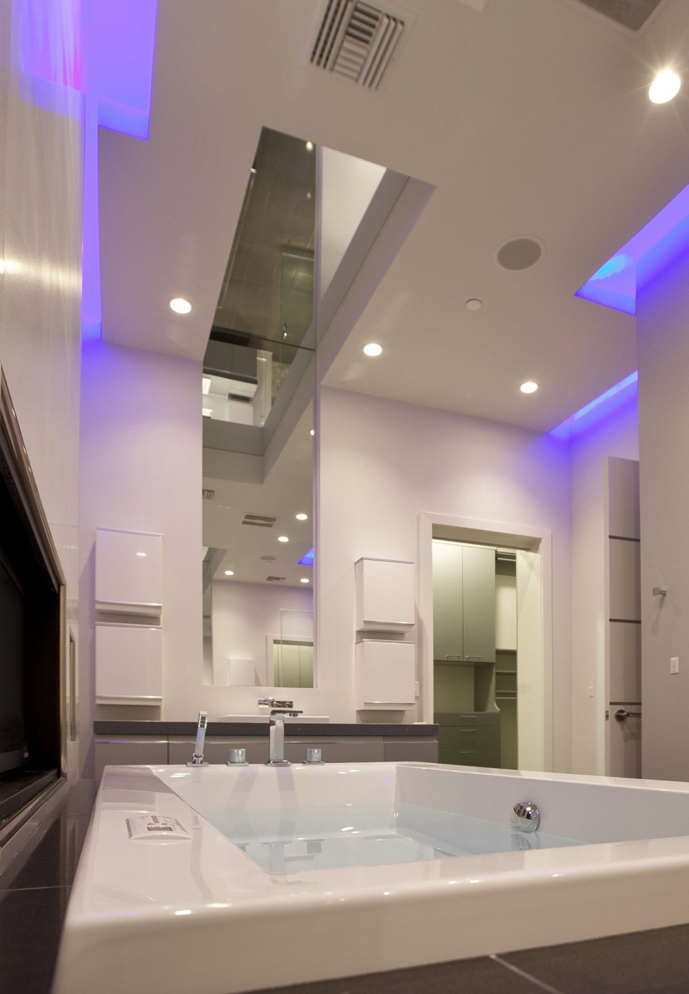 Bathroom, Large Mirror, Blue LED Lighting, Hurtado Residence in Las Vegas by Mark Tracy of Chemical Spaces