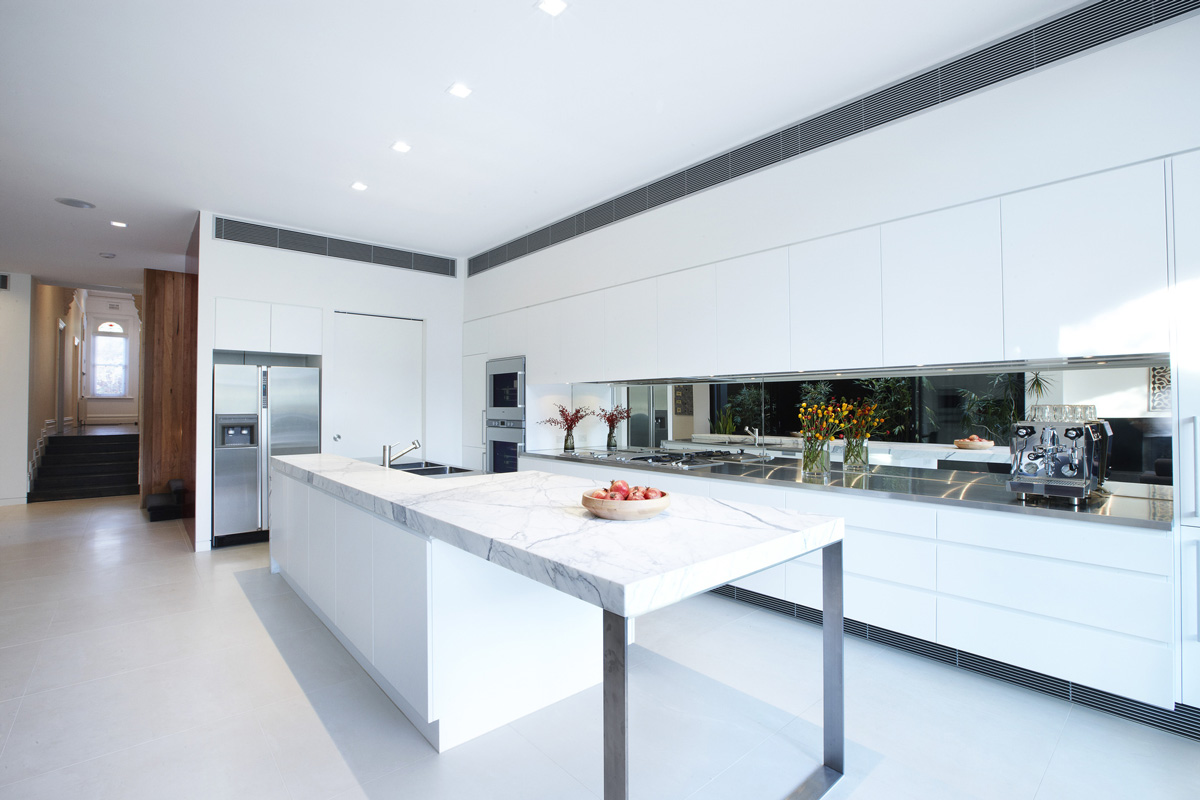 White Kitchen Island, Marble Counter, Enclave House in Melbourne, Australia by BKK Architects