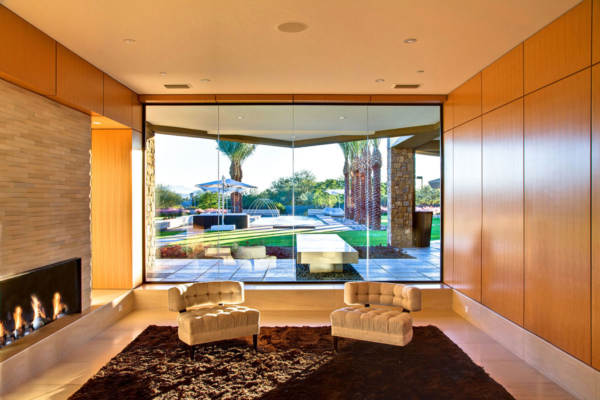 Brown Rug, Fireplace, Glass Walls, Ironwood Estate in Paradise Valley, Arizona by Kendle Design Collaborative
