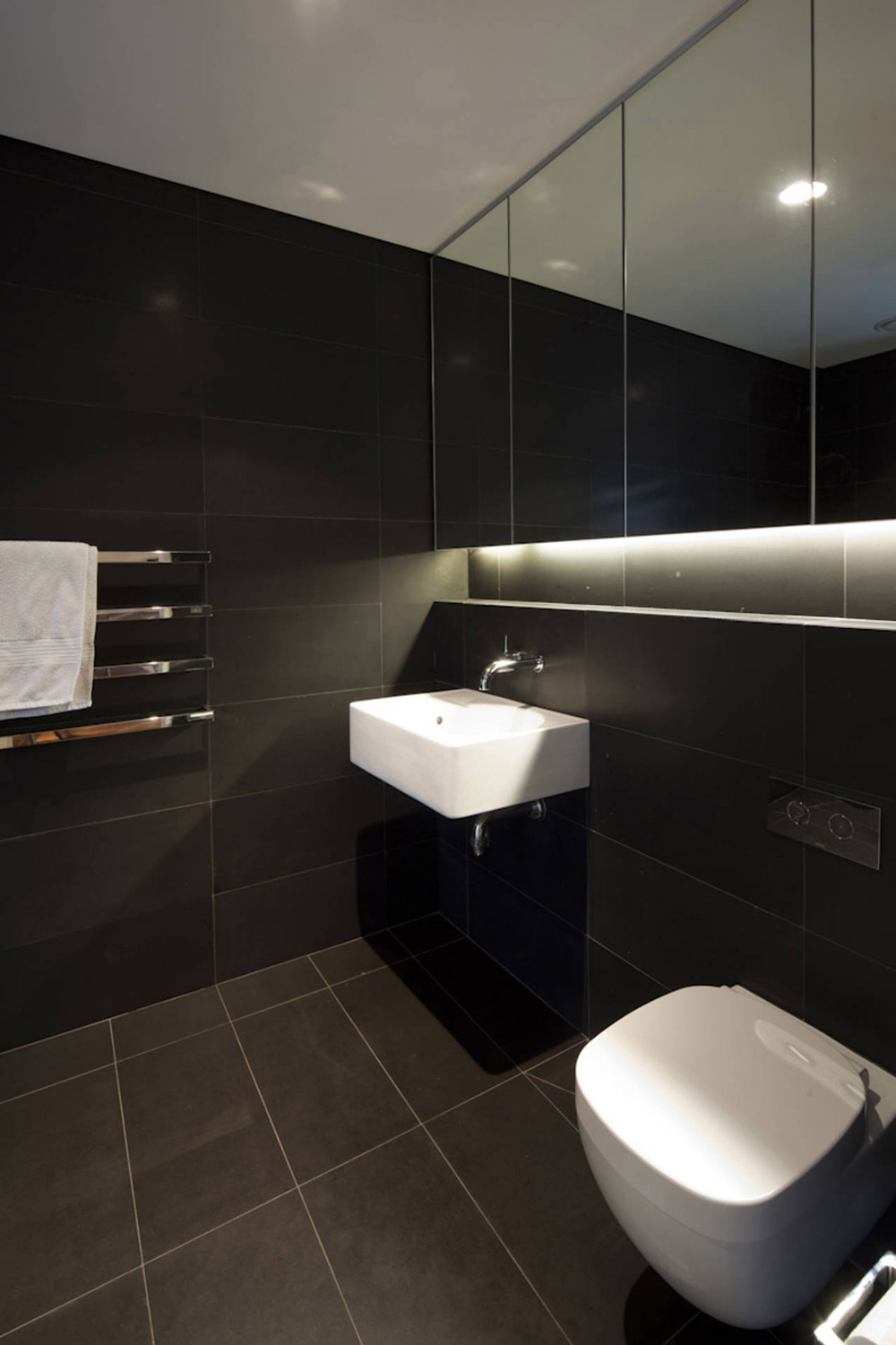 Dark Tiled Bathroom, Vaucluse House in Sydney, Australia by MPR Design Group