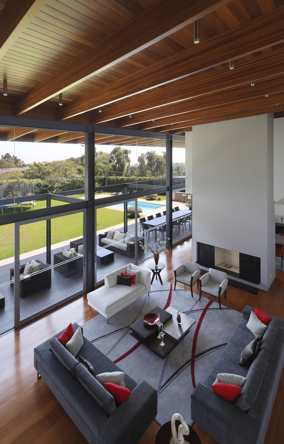High Ceilings, Floor-to-Ceiling Windows, Fireplace, Sofas, Imposing Family Home in Lima, Peru