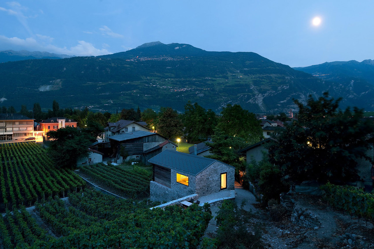 Evening Lighting, Grape Vines, Mountain Views, Home Remodel in Vétroz, Switzerland
