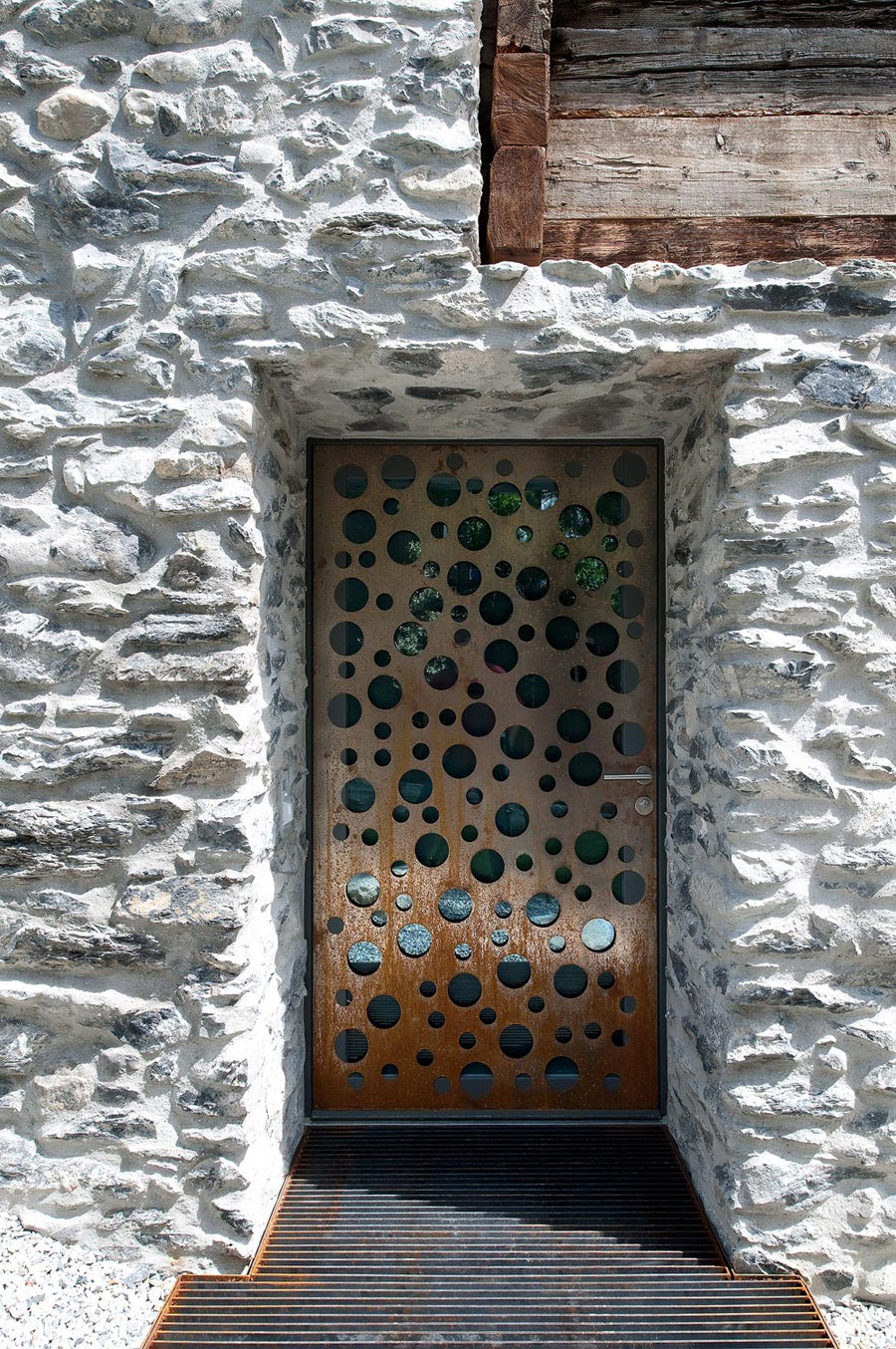 Metal Door, Stone Walls, Home Remodel in Vétroz, Switzerland