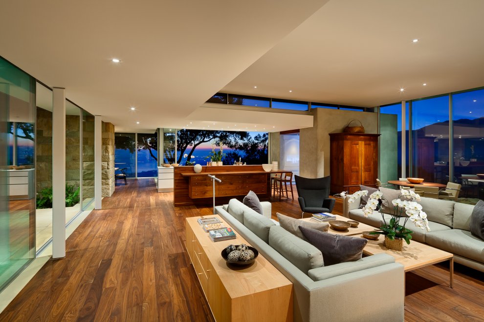 Sofas, Wood Floor, Living Room, Hilltop Home in Carpinteria, California