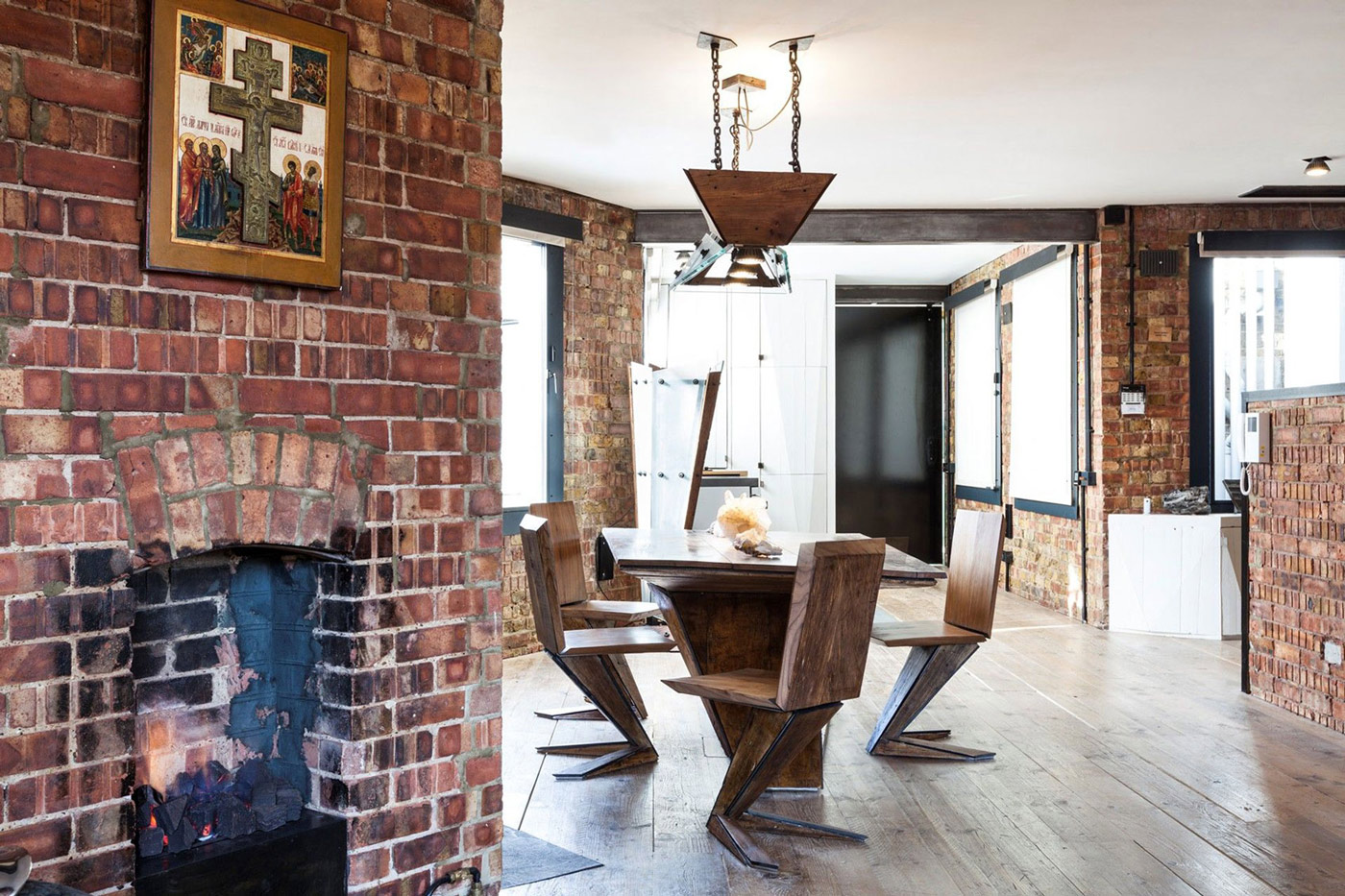Wooden Dining Table, Fireplace, Archer Street Apartment in London, England