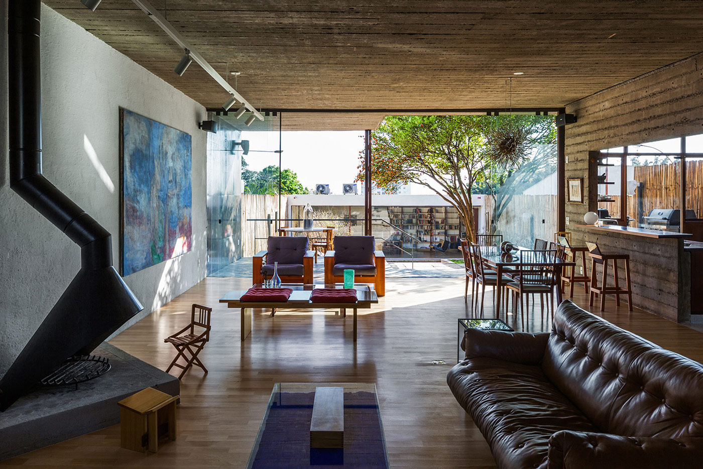 Contemporary Fireplace, Leather Sofa, Urban House in São Paulo, Brazil